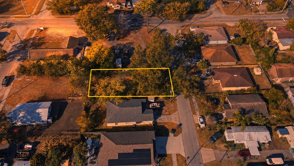 Aerial view of the vacant lot at 3405 E Powhatan Avenue in Tampa, Florida